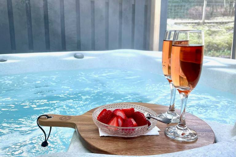 Relax in the hot tub at Bluebell Cottage, luxury accommodation Glencoe in the Highlands of Scotland.
