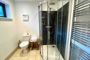 The shower room with rainfall shower at Bluebell Cottage Glencoe